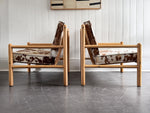 A Pair of 1970's Italian Lounge Armchairs with Cowhide Upholstery