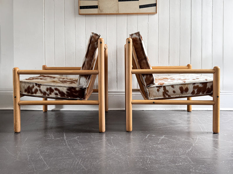 A Pair of 1970's Italian Lounge Armchairs with Cowhide Upholstery