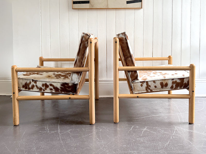A Pair of 1970's Italian Lounge Armchairs with Cowhide Upholstery