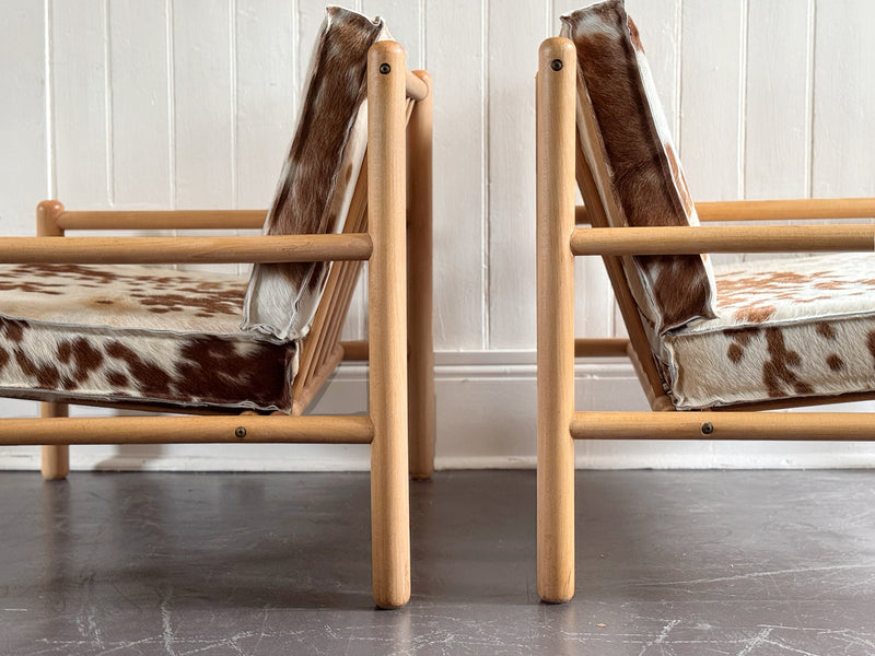 A Pair of 1970's Italian Lounge Armchairs with Cowhide Upholstery