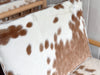 A Pair of 1970's Italian Lounge Armchairs with Cowhide Upholstery
