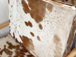 A Pair of 1970's Italian Lounge Armchairs with Cowhide Upholstery