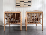 A Pair of 1970's Italian Lounge Armchairs with Cowhide Upholstery