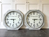 Two 1920's French Railway Clocks with Opal Glass Faces