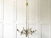 A Pair of 1950's Italian Brass Plated 12 Arm Chandeliers
