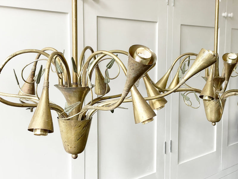 A Pair of 1950's Italian Brass Plated 12 Arm Chandeliers
