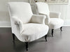 A Pair of Napoleon III Scroll Back Linen Covered Armchairs