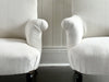 A Pair of Napoleon III Scroll Back Linen Covered Armchairs