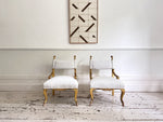 A Pair of Petite Regency Gilt Wood Armchairs