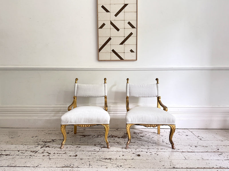 A Pair of Petite Regency Gilt Wood Armchairs