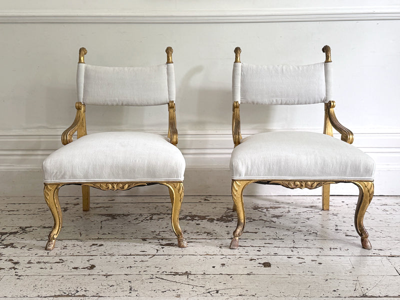A Pair of Petite Regency Gilt Wood Armchairs