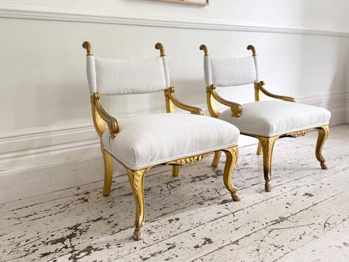 A Pair of Petite Regency Gilt Wood Armchairs