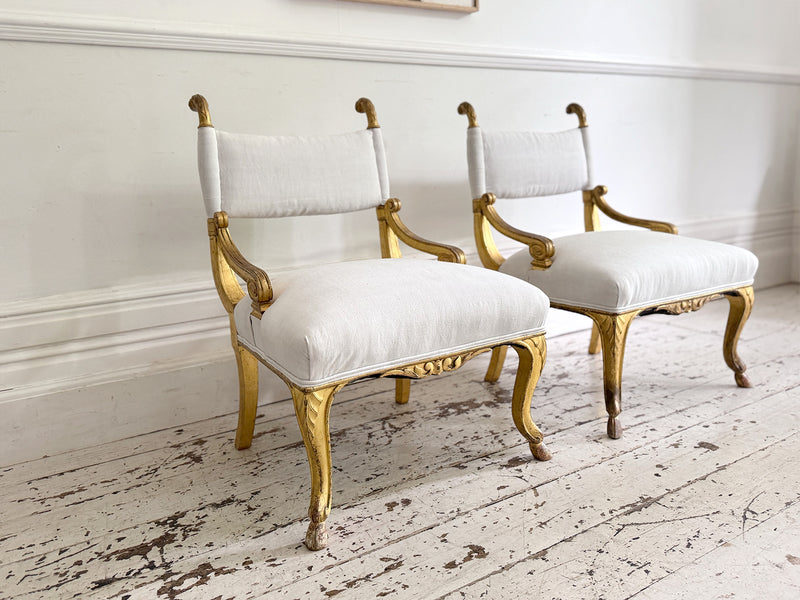 A Pair of Petite Regency Gilt Wood Armchairs