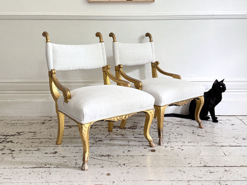 A Pair of Petite Regency Gilt Wood Armchairs
