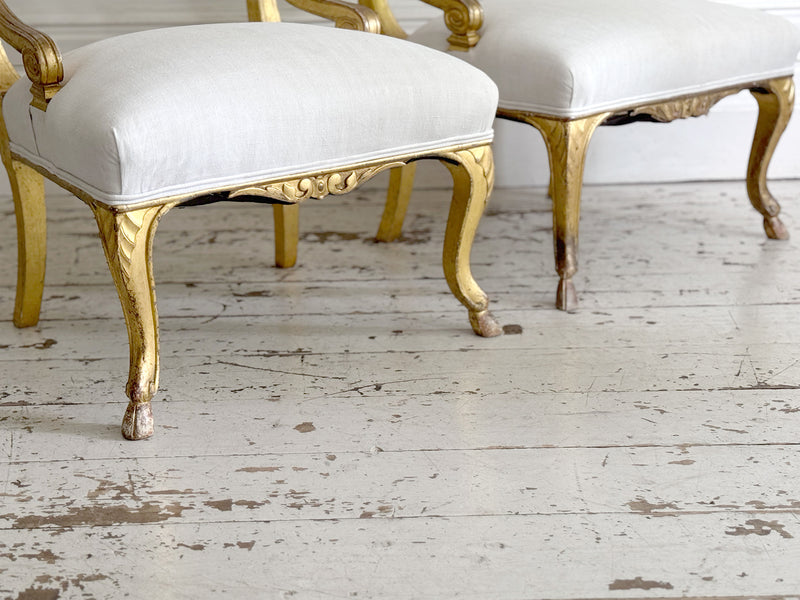 A Pair of Petite Regency Gilt Wood Armchairs