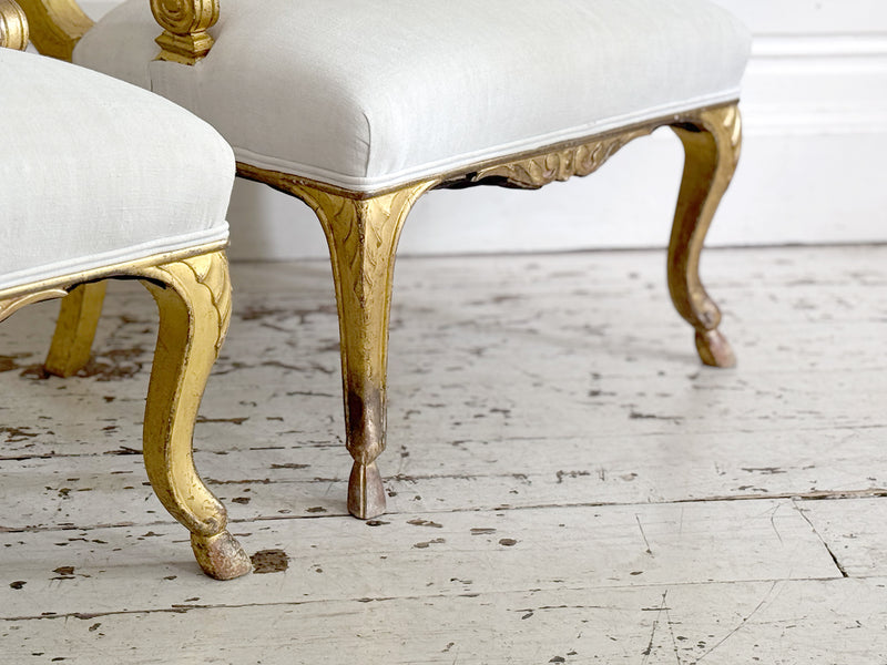 A Pair of Petite Regency Gilt Wood Armchairs