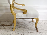 A Pair of Petite Regency Gilt Wood Armchairs