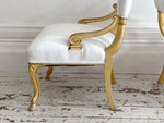 A Pair of Petite Regency Gilt Wood Armchairs