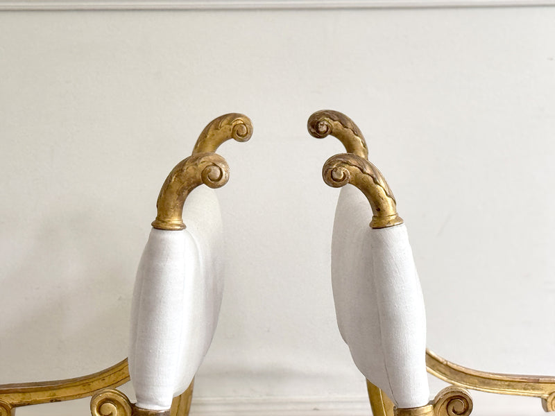 A Pair of Petite Regency Gilt Wood Armchairs