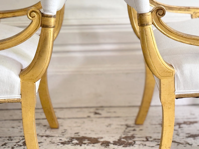 A Pair of Petite Regency Gilt Wood Armchairs