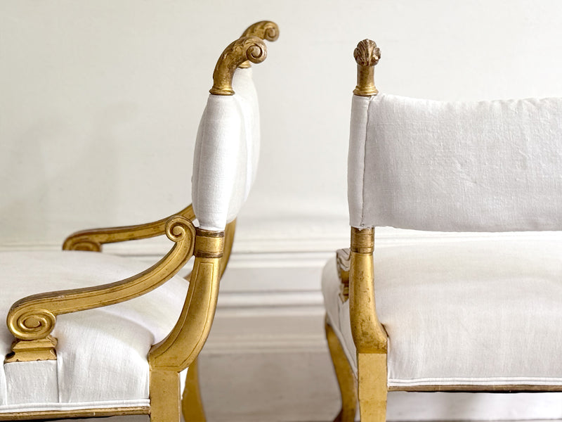 A Pair of Petite Regency Gilt Wood Armchairs
