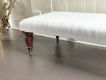 A Regency Ottoman with Beautifully Shaped Carved Mahogany Legs