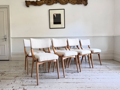 A Set of Eight 1960's Dining Chairs with Bouclé Upholstery