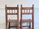 A Set of 8 Antique Spanish Folk Art Dining Chairs with Woven Seats