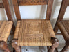 A Set of 8 Antique Spanish Folk Art Dining Chairs with Woven Seats