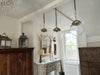 A Set of Three Czechoslovakian Glass Globe Pendant Lights