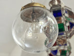 A Set of Three Czechoslovakian Glass Globe Pendant Lights