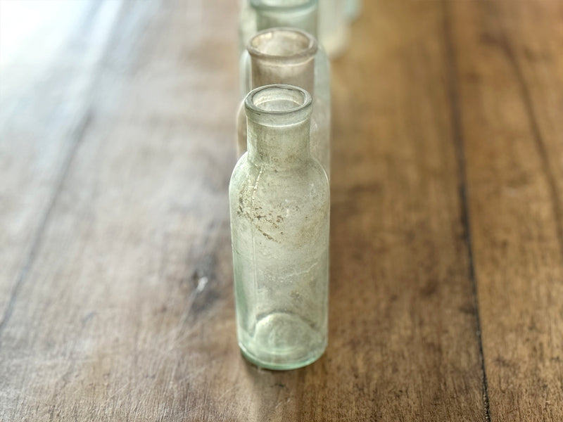 22 Small Antique Glass Bottles - Sold in 3's