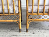 Two Pairs of 1950's French Bamboo Armchairs with Brass Details