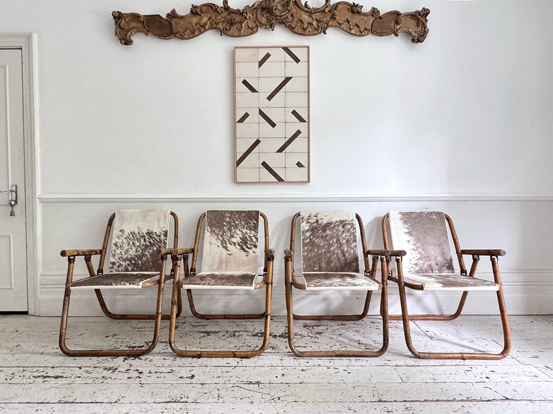 Two Pairs of 1970's Folding Bamboo Cowhide Armchairs