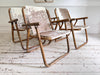 Two Pairs of 1970's Folding Bamboo Cowhide Armchairs