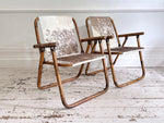 Two Pairs of 1970's Folding Bamboo Cowhide Armchairs