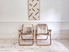 Two Pairs of 1970's Folding Bamboo Cowhide Armchairs