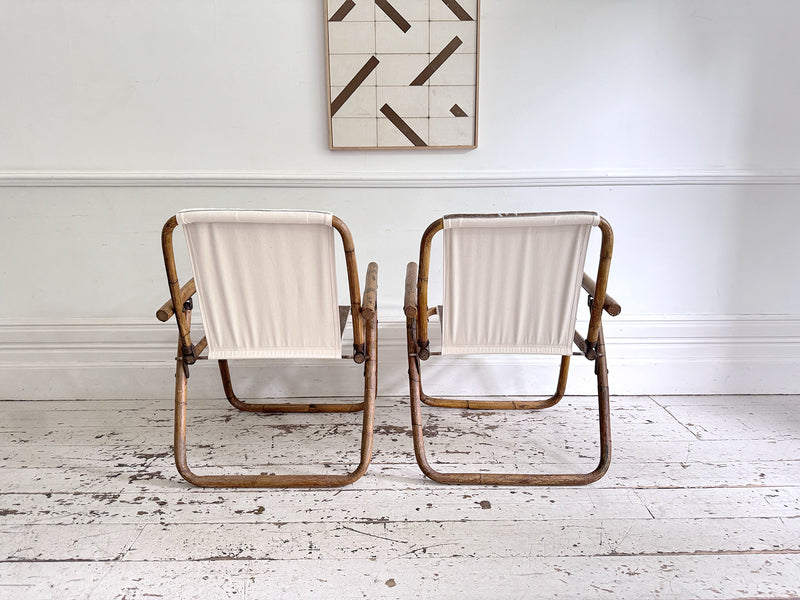 Two Pairs of 1970's Folding Bamboo Cowhide Armchairs
