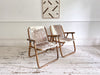 Two Pairs of 1970's Folding Bamboo Cowhide Armchairs