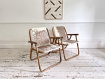 Two Pairs of 1970's Folding Bamboo Cowhide Armchairs