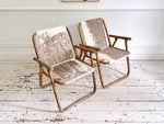 Two Pairs of 1970's Folding Bamboo Cowhide Armchairs