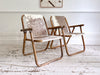 Two Pairs of 1970's Folding Bamboo Cowhide Armchairs