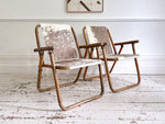 Two Pairs of 1970's Folding Bamboo Cowhide Armchairs