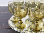 A Set of 9 Vintage Green Biot Wine Glasses