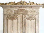 An 18th Century Bleached Oak Marriage Armoire with Beautiful Carving