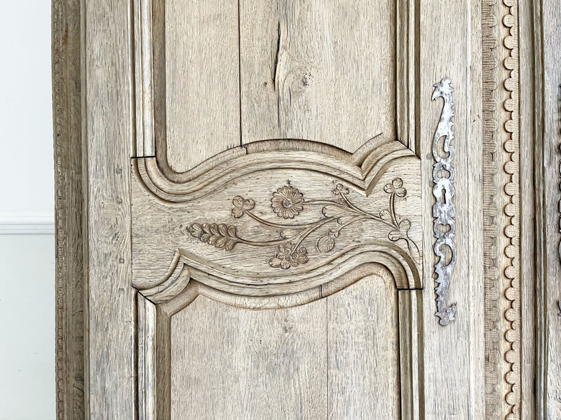 An 18th Century Bleached Oak Marriage Armoire with Beautiful Carving