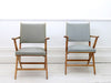 Three 1950's cherry wood geometric vinyl covered armchairs