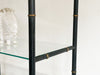 A 1950's Italian Black Metal Faux Bamboo  Etagere with Gilt Details