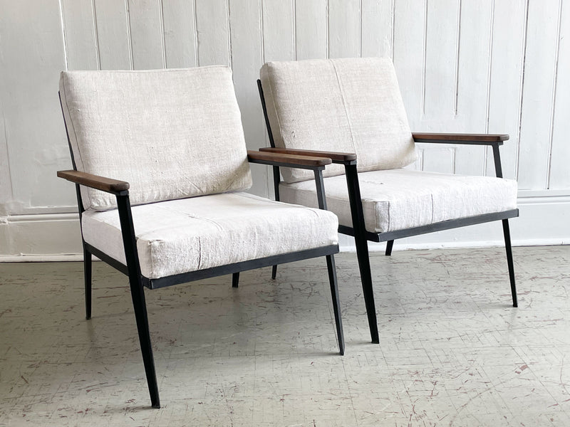 Two Pairs of 1970's American Black Metal Armchairs