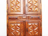 A Louis XIII Fruitwood French Four Door Two Drawer Linen Cupboard